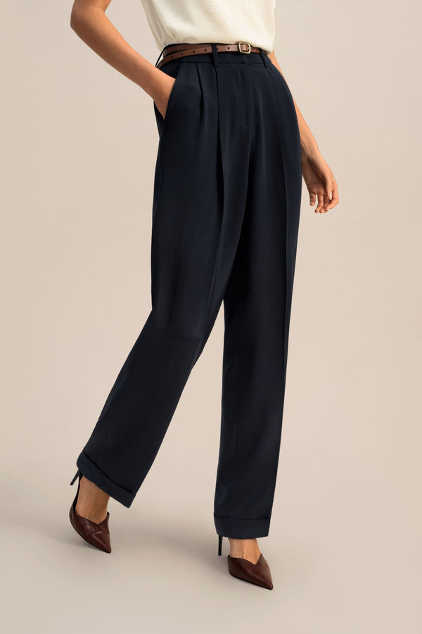 Navy Pleated Cuffed Trousers - in motion